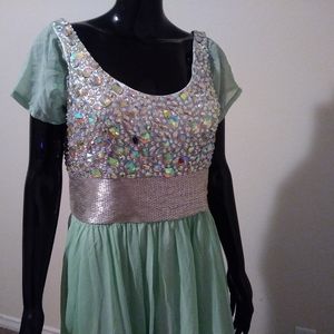 A dress formal very clean light green color